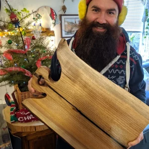 HWTC Brett posing with a custom charcuterie board