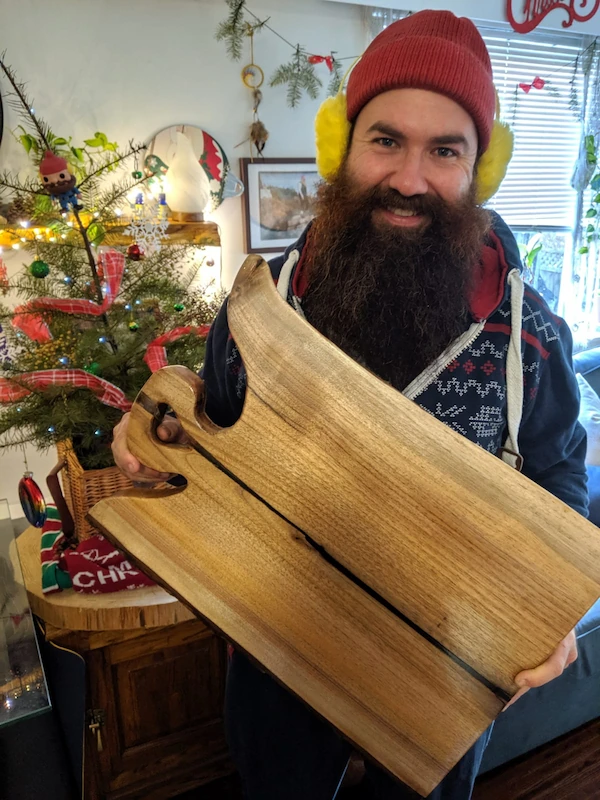 HWTC Brett posing with a custom charcuterie board