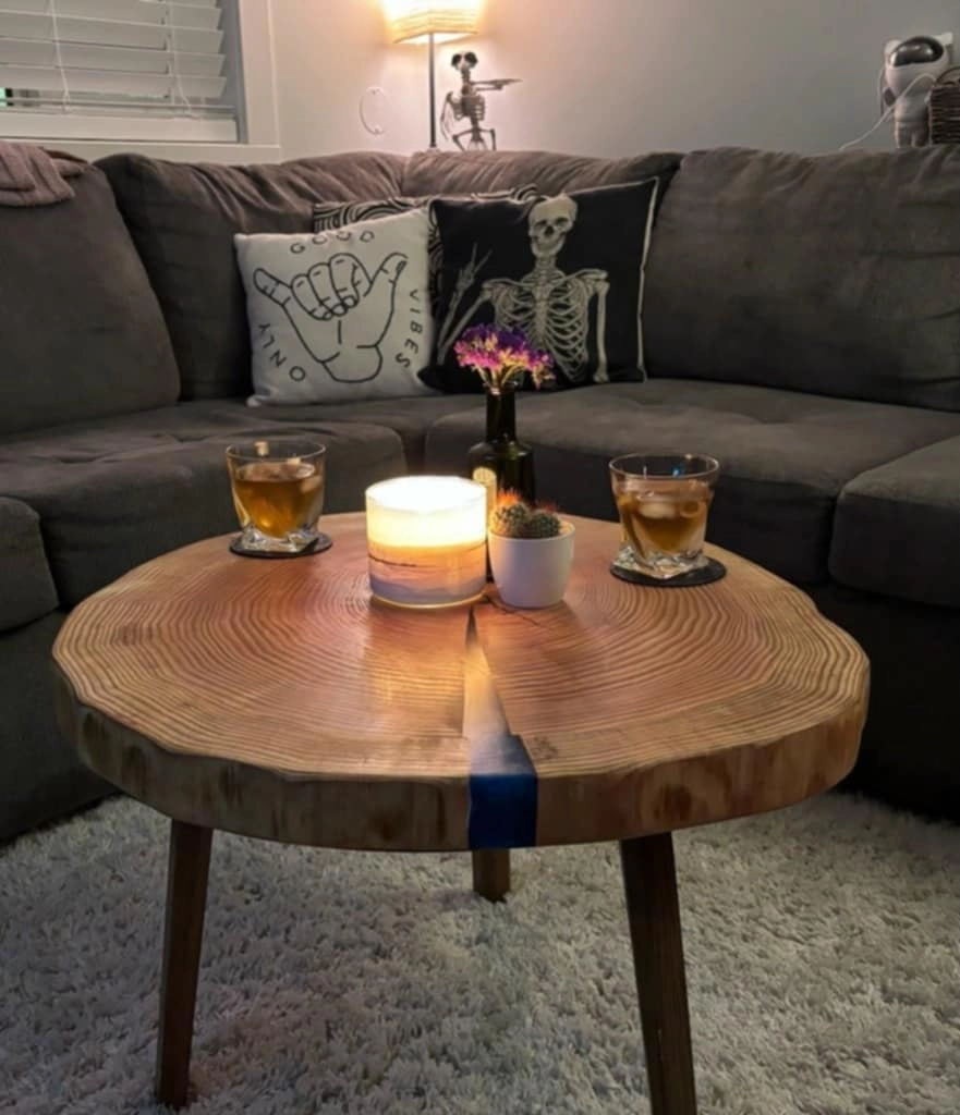picture of a small live edge and resin coffee table in a nanaimo living room